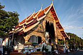 Chiang Mai - The Wat Phra Singh temple. The large Viharn Luang (main prayer hall) with an intricately carved front.  